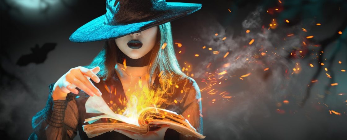 Halloween,Witch,Girl,With,Magic,Book,Of,Spells,Portrait.,Beautiful